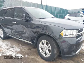 2013 Dodge Durango Crew z VIN 1C4SDJDT7DC684766, wystawiony jako IAAI lot #41277670 z przebiegiem 115 555 mil mil oraz . Historia ofert i sprzedaży dostępna na DreamBid. Obrazek 6.