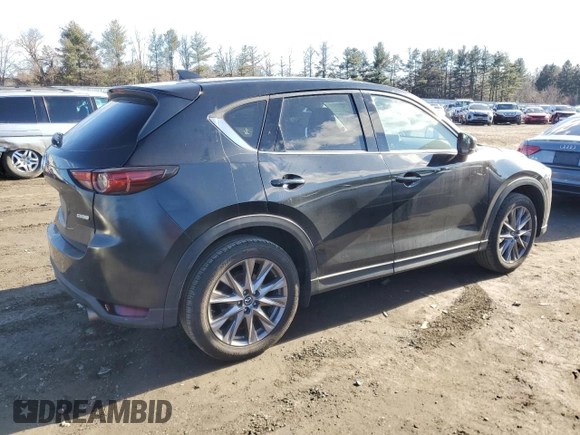 2019 Mazda CX-5 Grand Touring with VIN JM3KFBDM0K0571806, listed as a Copart auction lot 43395105 with 57,768 mi miles and Salvage Title. Bid and sale history available at carsss.com. Image 3.