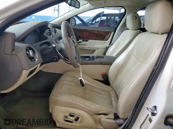 2011 Jaguar XJ with VIN SAJWA1CB2BLV07172, listed as a Copart auction lot 63343085 with 135,119 mi miles and Salvage title. Bid and sale history available at DreamBid. Image 7.
