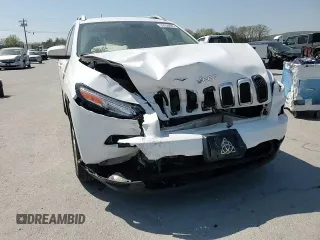 2018 Jeep Cherokee Latitude with VIN 1C4PJLCB6JD587468, listed as a Copart auction lot 52258695 with 136,466 mi miles and Salvage title. Bid and sale history available at DreamBid. Image 12.