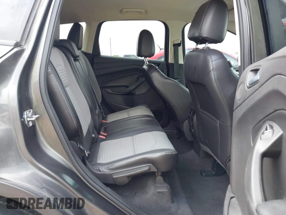 2017 Ford Escape SE with VIN 1FMCU0G99HUC65571, listed as a IAAI auction lot 41923517 with 77,179 mi miles and . Bid and sale history available at DreamBid. Image 8.