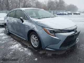 2020 Toyota Corolla Hybrid LE with VIN JTDEBRBE3LJ028824, listed as a IAAI auction lot 41166211 with 86,700 mi miles. Bid and sale history available at carsss.com. Image 1.