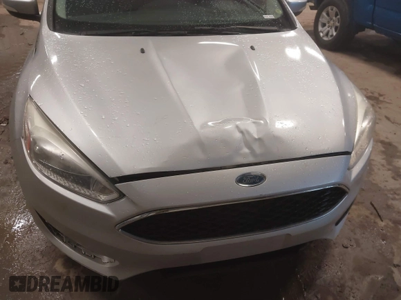 2015 Ford Focus SE with VIN 1FADP3K29FL328611, listed as a IAAI auction lot 41669844 with 136,666 mi miles. Bid and sale history available at carsss.com. Image 6.