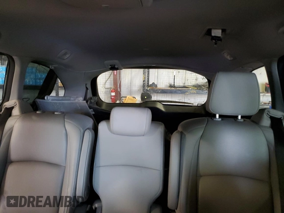 2021 Honda Odyssey Touring with VIN 5FNRL6H84MB009125, listed as a Copart auction lot 58248385 with 55,360 mi miles and Salvage title. Bid and sale history available at DreamBid. Image 10.