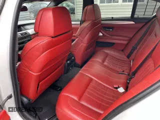 2014 BMW M5 z VIN WBSFV9C50ED097667, wystawiony jako Copart lot #55102255 z przebiegiem 145 086 mil mil oraz Tytuł czysty. Historia ofert i sprzedaży dostępna na DreamBid. Obrazek 5.