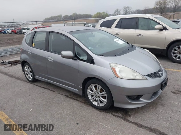 2009 Honda Fit Sport with VIN JHMGE88469S063030, listed as a IAAI auction lot 42064670 with 156,791 mi miles. Bid and sale history available at carsss.com. Image 1.