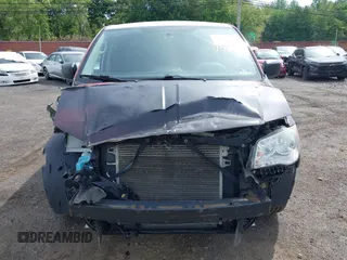 2013 Ram Cargo Van Tradesman with VIN 2C4JRGAG3DR735792, listed as a IAAI auction lot 42342661 with 82,676 mi miles and . Bid and sale history available at DreamBid. Image 12.