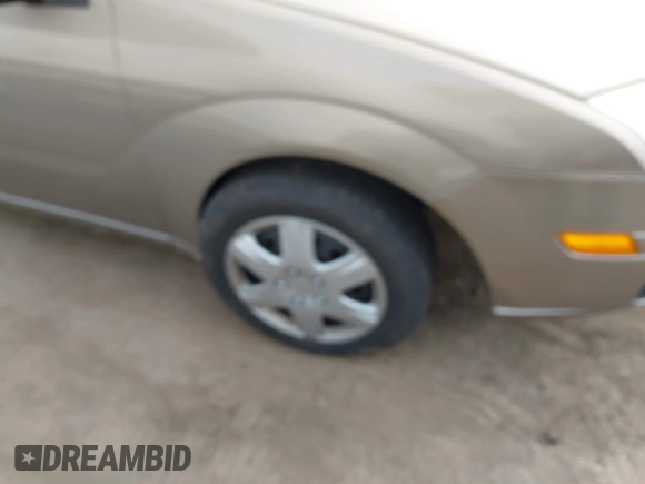 2005 Ford Focus S with VIN 1FAHP34N35W144951, listed as a IAAI auction lot 41880459 with 141,333 mi miles and . Bid and sale history available at carsss.com. Image 6.