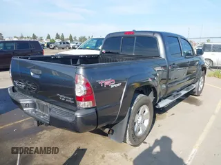 2009 Toyota Tacoma PreRunner with VIN 3TMKU72N99M021678, listed as a IAAI auction lot 41763776 with 155,381 mi miles and . Bid and sale history available at DreamBid. Image 4.
