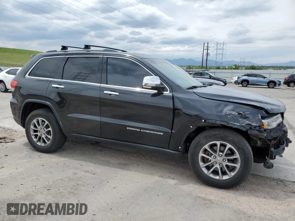 2014 Jeep Grand Cherokee Limited with VIN 1C4RJFBG0EC517032, listed as a Copart auction lot 58813355 with 173,616 mi miles and Salvage title. Bid and sale history available at DreamBid. Image 4.