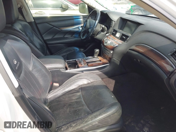 2013 Infiniti M with VIN JN1BY1AP4DM511067, listed as a IAAI auction lot 41890196 with 316,837 mi miles and . Bid and sale history available at DreamBid. Image 5.