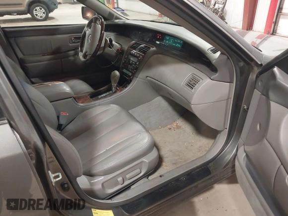 2004 Toyota Avalon XL z VIN 4T1BF28B64U389214, wystawiony jako IAAI lot #42131695 z przebiegiem 187 352 mil mil oraz . Historia ofert i sprzedaży dostępna na DreamBid. Obrazek 5.