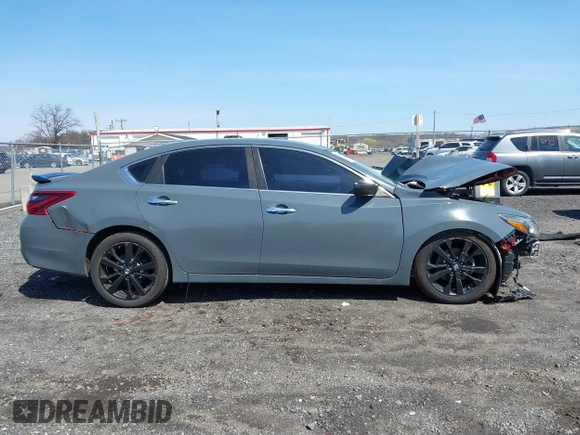 2017 Nissan Altima S z VIN 1N4AL3AP5HC234322, wystawiony jako IAAI lot #41947565 z przebiegiem 174 659 mil mil oraz . Historia ofert i sprzedaży dostępna na DreamBid. Obrazek 13.