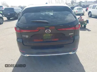 2024 Mazda CX-90 Premium z VIN JM3KKDHD4R1141475, wystawiony jako IAAI lot #41813198 z przebiegiem 30 352 mil mil oraz . Historia ofert i sprzedaży dostępna na DreamBid. Obrazek 16.