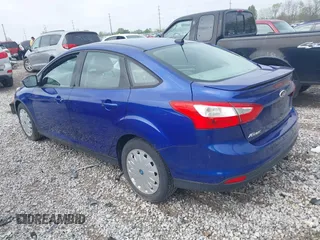 2012 Ford Focus SE with VIN 1FAHP3F2XCL266692, listed as a IAAI auction lot 42130412 with 114,608 mi miles and . Bid and sale history available at carsss.com. Image 3.
