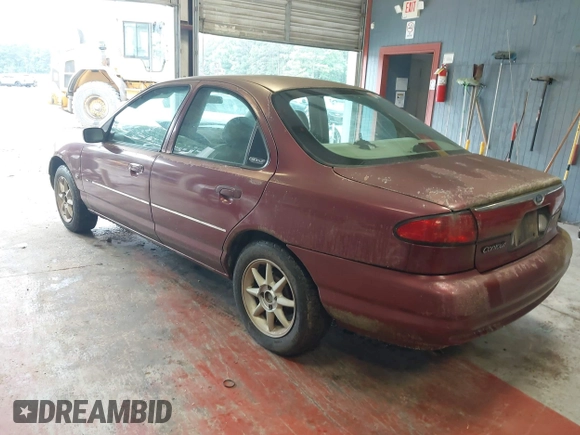 1999 Ford Contour SE z VIN 1FAFP6639XK144984, wystawiony jako IAAI lot #42363538 z przebiegiem 160 891 mil mil oraz . Historia ofert i sprzedaży dostępna na DreamBid. Obrazek 3.