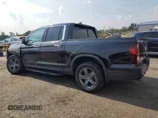 2022 Honda Ridgeline RTL-E with VIN 5FPYK3F7XNB023787, listed as a Copart auction lot 66883515 with 49,786 mi miles and Salvage title. Bid and sale history available at DreamBid. Image 2.