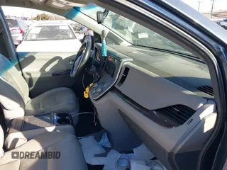 2016 Toyota Sienna XLE with VIN 5TDYK3DC8GS720852, listed as a IAAI auction lot 41341268 with 119,927 mi miles. Bid and sale history available at carsss.com. Image 5.