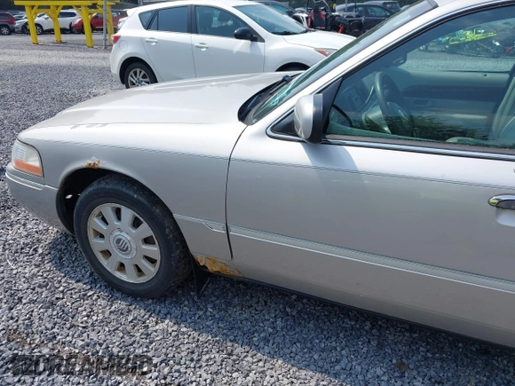 2004 Mercury Grand Marquis LS Premium z VIN 2MEFM75W04X634791, wystawiony jako IAAI lot #42482387 z przebiegiem 133 145 mil mil oraz . Historia ofert i sprzedaży dostępna na DreamBid. Obrazek 6.