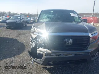2022 Honda Ridgeline RTL z VIN 5FPYK3F51NB038239, wystawiony jako IAAI lot #41937070 z przebiegiem 39 012 mil mil oraz . Historia ofert i sprzedaży dostępna na DreamBid. Obrazek 6.