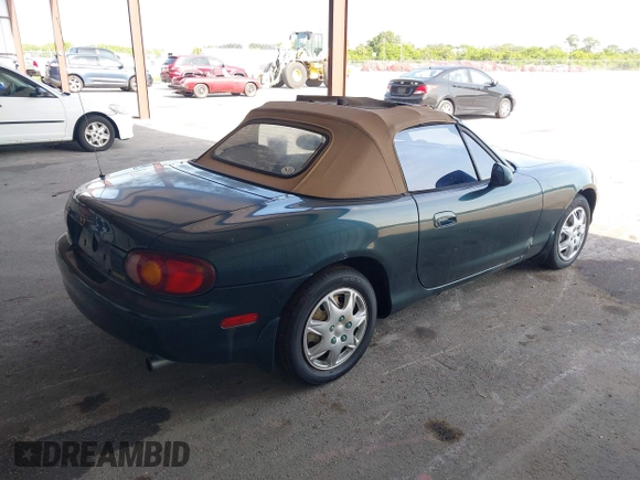 1999 Mazda MX-5 Miata with VIN JM1NB3530X0133971, listed as a IAAI auction lot 42652996 with 19,270 mi miles and . Bid and sale history available at DreamBid. Image 4.