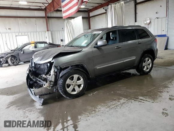 2013 Jeep Grand Cherokee Laredo with VIN 1C4RJFAG3DC612250, listed as a Copart auction lot 53155455 with 157,895 mi miles and Salvage Title. Bid and sale history available at carsss.com. Image 1.