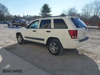 2006 Jeep Grand Cherokee Laredo with VIN 1J4GS48K36C279970, listed as a IAAI auction lot 41655785 with 180,348 mi miles. Bid and sale history available at carsss.com. Image 3.