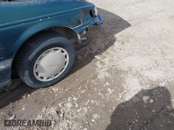 1995 Ford Taurus GL with VIN 1FALP52U2SA113070, listed as a IAAI auction lot 41869576 with 16,935 mi miles and . Bid and sale history available at DreamBid. Image 14.