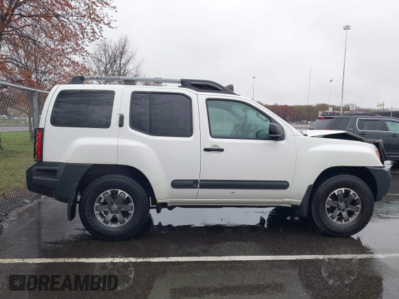 2014 Nissan Xterra X with VIN 5N1AN0NW4EN814113, listed as a IAAI auction lot 41969236 with 111,857 mi miles and . Bid and sale history available at DreamBid. Image 13.