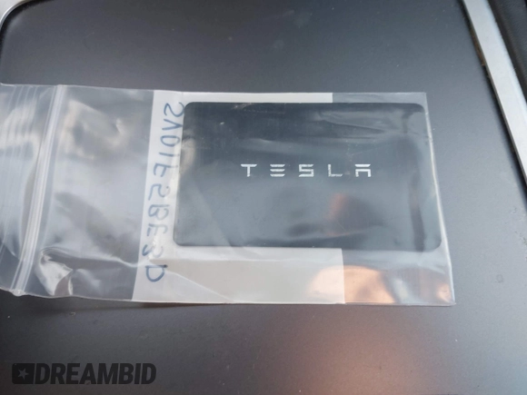 2023 Tesla Model 3 with VIN 5YJ3E1EAXPF436212, listed as a IAAI auction lot 41727400 with 81,011 mi miles and . Bid and sale history available at carsss.com. Image 11.