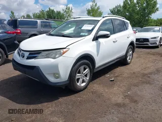 2013 Toyota RAV4 XLE with VIN JTMRFREV4D5000543, listed as a IAAI auction lot 42703469 with 231,337 mi miles and . Bid and sale history available at DreamBid. Image 2.