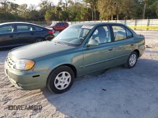 2005 Hyundai Accent GLS with VIN KMHCG45C35U595666, listed as a Copart auction lot 88294365 with 70,497 mi miles and Salvage Title. Bid and sale history available at carsss.com. Image 1.