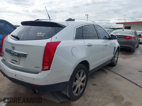 2013 Cadillac SRX Performance Collection z VIN 3GYFNDE38DS542736, wystawiony jako IAAI lot #42398648 z przebiegiem 266 059 mil mil oraz . Historia ofert i sprzedaży dostępna na DreamBid. Obrazek 6.