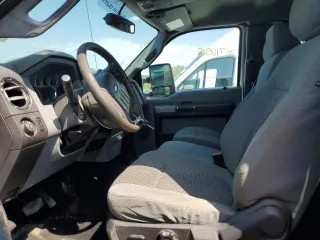 2014 Ford F-250 XL with VIN 1FT7X2B67EEA13796, listed as a Copart auction lot 61712565 with 130,090 mi miles and Salvage title. Bid and sale history available at DreamBid. Image 7.