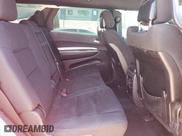 2014 Dodge Durango SXT z VIN 1C4RDJAG4EC980139, wystawiony jako Copart lot #57509035 z przebiegiem 152 865 mil mil oraz Szkoda całkowita • Salvage title. Historia ofert i sprzedaży dostępna na DreamBid. Obrazek 11.