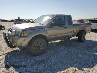 2004 Nissan Frontier XE Desert Runner with VIN 1N6ED26Y24C429693, listed as a Copart auction lot 52411095 with 216,430 mi miles and Salvage title. Bid and sale history available at DreamBid. Image 1.