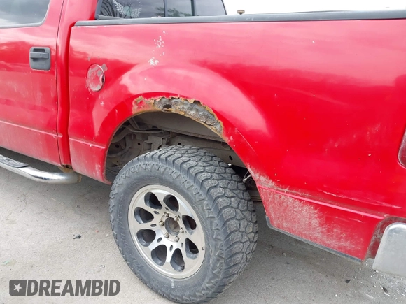 2005 Ford F-150 XLT with VIN 1FTPW12505FB56152, listed as a IAAI auction lot 42034990 with 257,822 mi miles. Bid and sale history available at carsss.com. Image 13.