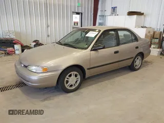 2001 Chevrolet Prizm z VIN 1Y1SK52811Z400984, wystawiony jako IAAI lot #42550019 z przebiegiem 226 246 mil mil oraz . Historia ofert i sprzedaży dostępna na DreamBid. Obrazek 17.