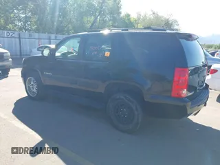 2007 GMC Yukon SLT z VIN 1GKFK13047J289558, wystawiony jako IAAI lot #42315709 z przebiegiem Nie podano mil oraz . Historia ofert i sprzedaży dostępna na DreamBid. Obrazek 3.