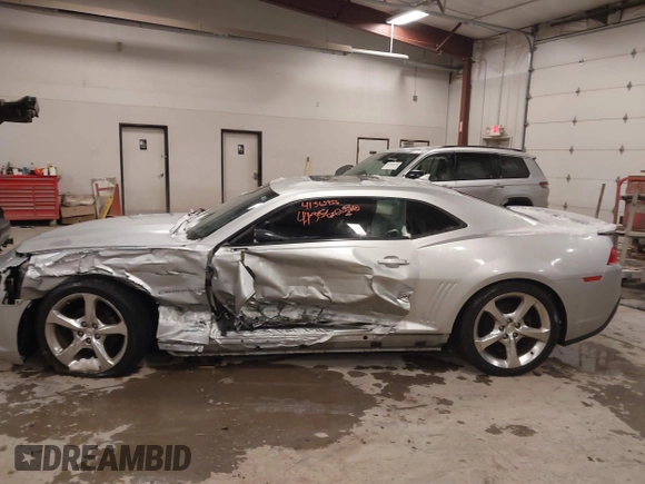 2014 Chevrolet Camaro LT z VIN 2G1FC1E31E9281774, wystawiony jako IAAI lot #41362956 z przebiegiem 144 936 mil mil oraz . Historia ofert i sprzedaży dostępna na DreamBid. Obrazek 14.