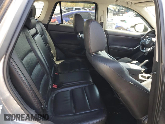 2014 Mazda CX-5 Grand Touring with VIN JM3KE4DY4E0305212, listed as a Copart auction lot 53145305 with 233,061 mi miles and Salvage Title. Bid and sale history available at carsss.com. Image 11.