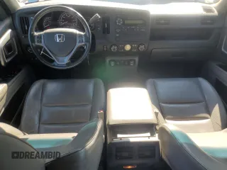 2012 Honda Ridgeline RTL with VIN 5FPYK1F55CB452206, listed as a Copart auction lot 74694204 with 128,226 mi miles and Clean Title. Bid and sale history available at carsss.com. Image 8.