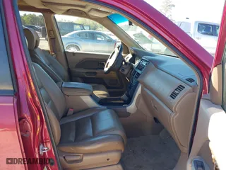 2006 Honda Pilot EX-L with VIN 5FNYF18566B022909, listed as a IAAI auction lot 40576412 with 310,278 mi miles. Bid and sale history available at carsss.com. Image 5.