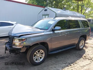2018 Chevrolet Tahoe LT with VIN 1GNSKBKC7JR393246, listed as a IAAI auction lot 42544844 with 87,994 mi miles and . Bid and sale history available at DreamBid. Image 2.