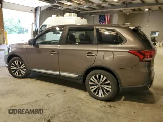 2019 Mitsubishi Outlander SE with VIN JA4AD3A39KZ010618, listed as a Copart auction lot 60504615 with 102,767 mi miles and Salvage title. Bid and sale history available at DreamBid. Image 2.