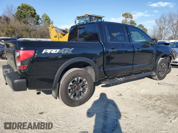 2024 Nissan Titan Pro-4X with VIN 1N6AA1ED6RN111104, listed as a Copart auction lot 46129425 with 4,903 mi miles and Salvage title. Bid and sale history available at DreamBid. Image 3.
