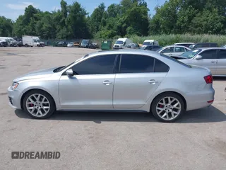 2014 Volkswagen Jetta GLI Autobahn with VIN 3VW5T7AJXEM310901, listed as a IAAI auction lot 42622301 with 139,821 mi miles and . Bid and sale history available at DreamBid. Image 14.