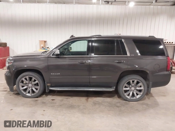2016 Chevrolet Tahoe LTZ with VIN 1GNSKCKC1GR201155, listed as a IAAI auction lot 42235228 with 184,585 mi miles and . Bid and sale history available at DreamBid. Image 14.
