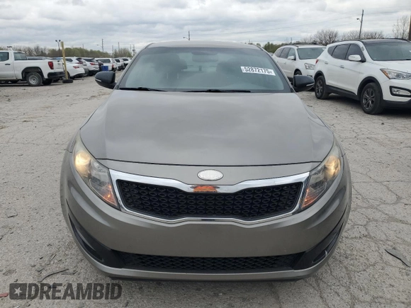 2013 Kia Optima EX z VIN 5XXGN4A7XDG224691, wystawiony jako Copart lot #52872175 z przebiegiem 218 951 mil mil oraz Szkoda całkowita • Salvage title. Historia ofert i sprzedaży dostępna na DreamBid. Obrazek 5.