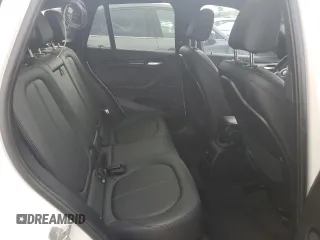2019 BMW X1 xDrive28i with VIN WBXHT3C52K3H34021, listed as a Copart auction lot 64032535 with 30,752 mi miles and Salvage title. Bid and sale history available at DreamBid. Image 10.